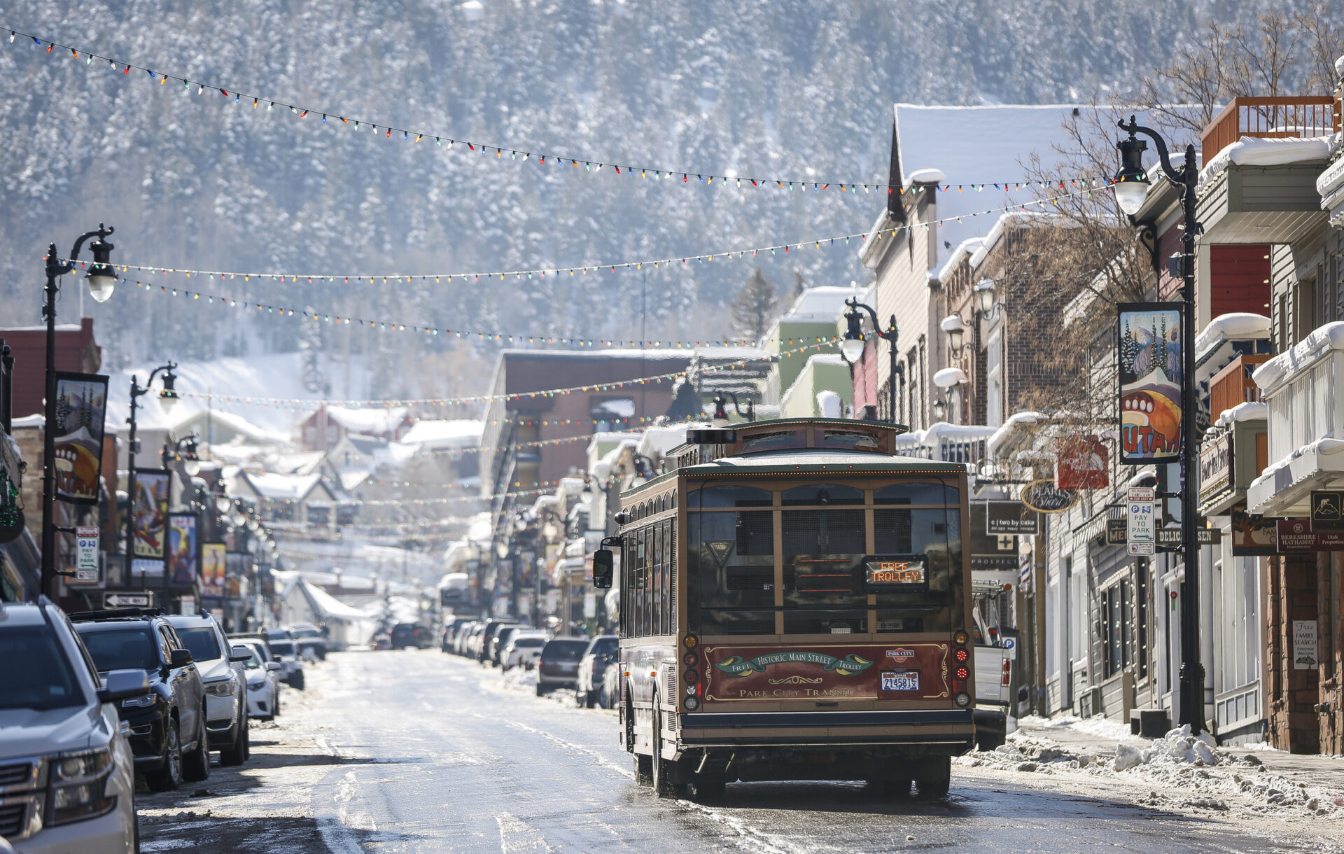 Trolley Driving Up Main Street Park City During Winter